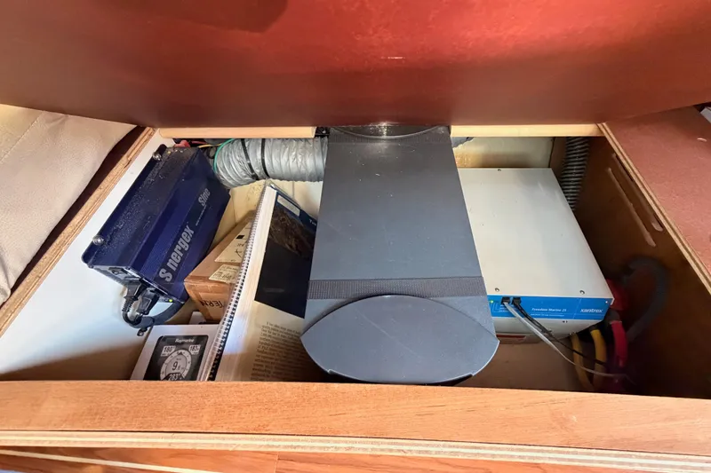 Slide: The Image of Electrical components inside a 2007 Hunter 44 Deck Salon yacht compartment. - 71