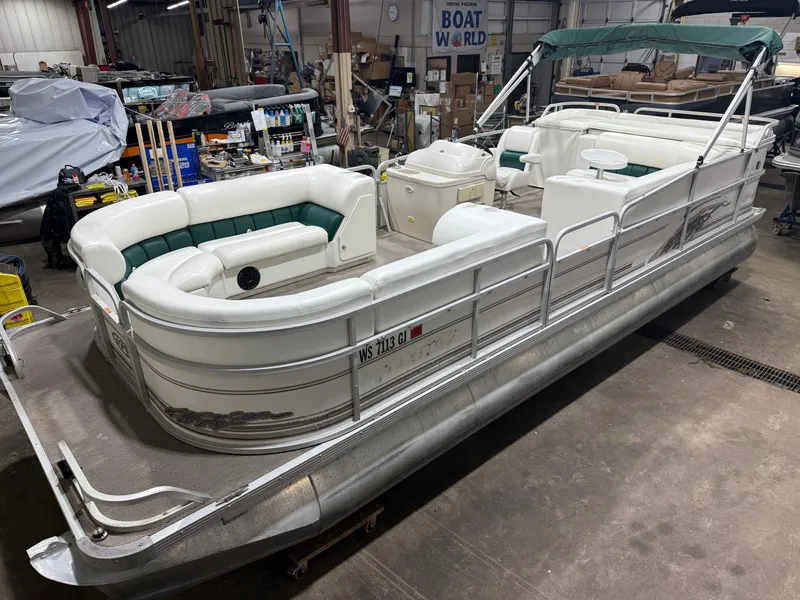 The Image of Manitou Legacy 240 & 2017 Mercury 4Stroke EFI $12,995 2001 - 1