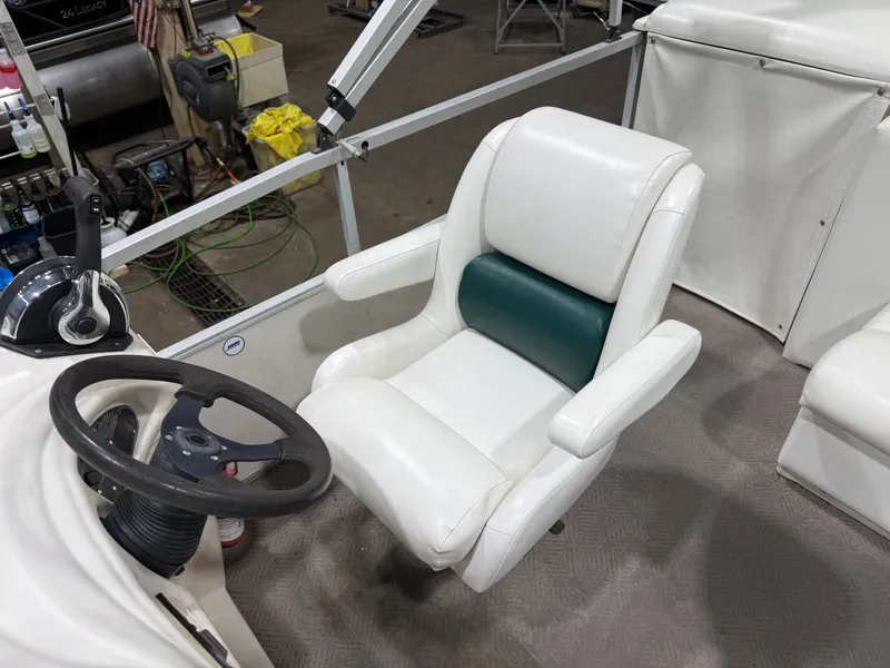 Slide: The Image of Manitou Legacy 240 & 2017 Mercury 4Stroke EFI $12,995 2001 - 12