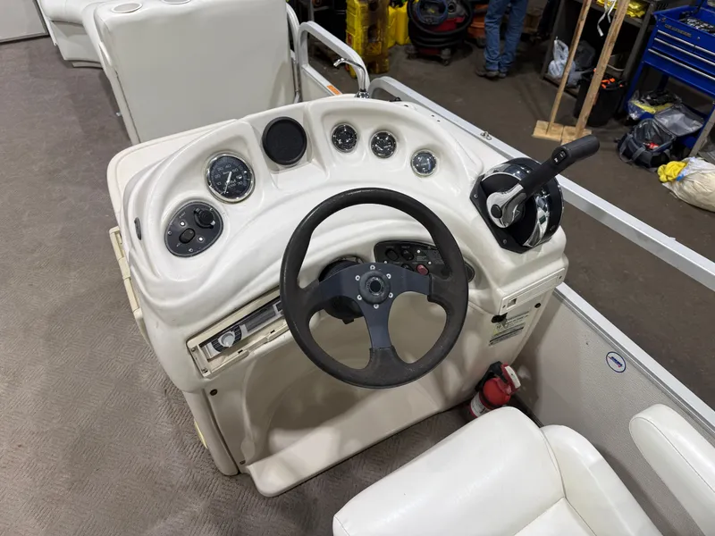 Slide: The Image of Manitou Legacy 240 & 2017 Mercury 4Stroke EFI $12,995 2001 - 13