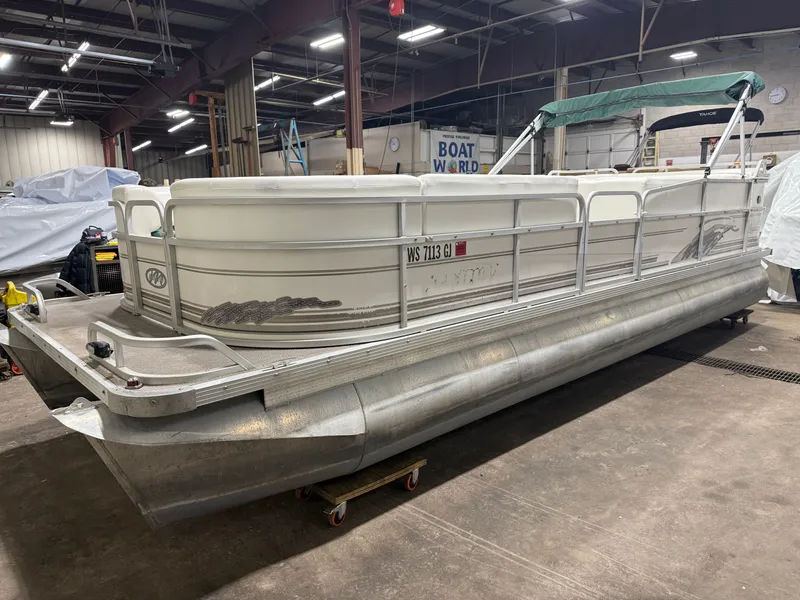 Slide: The Image of Manitou Legacy 240 & 2017 Mercury 4Stroke EFI $12,995 2001 - 16