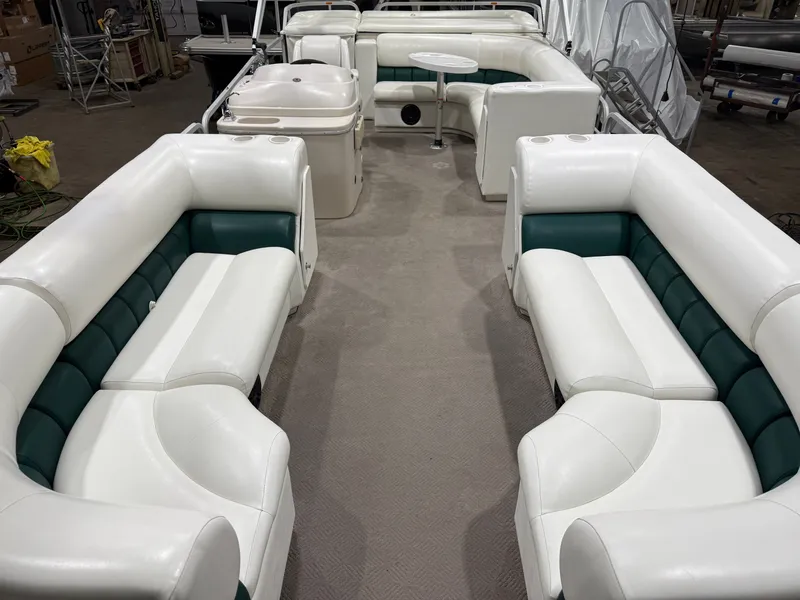 Slide: The Image of Manitou Legacy 240 & 2017 Mercury 4Stroke EFI $12,995 2001 - 2