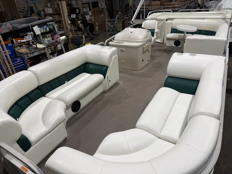 Slide: The Image of Manitou Legacy 240 & 2017 Mercury 4Stroke EFI $12,995 2001 - 25