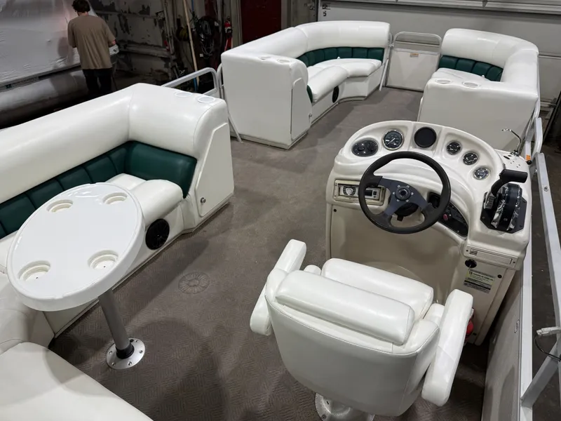 Slide: The Image of Manitou Legacy 240 & 2017 Mercury 4Stroke EFI $12,995 2001 - 26