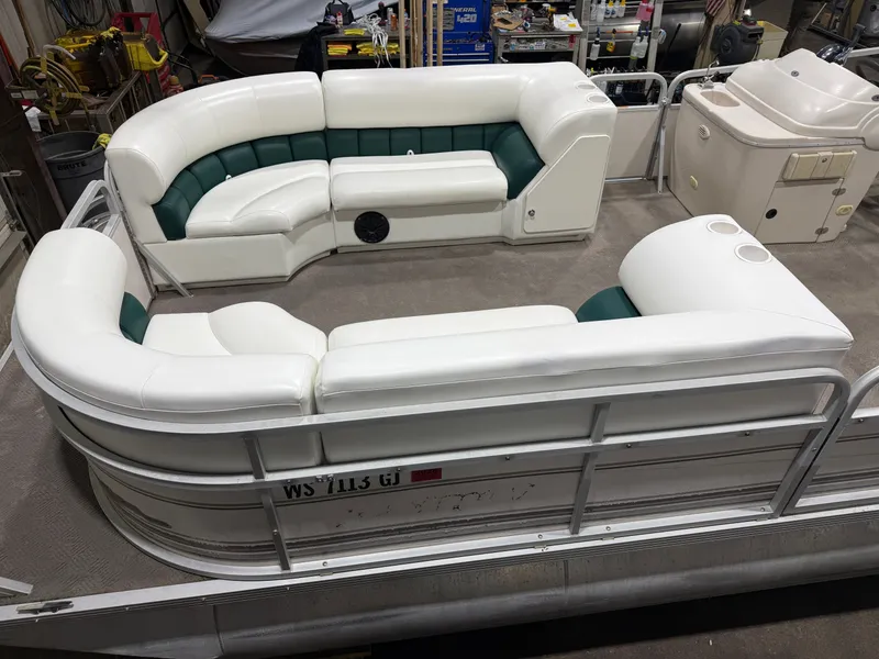 Slide: The Image of Manitou Legacy 240 & 2017 Mercury 4Stroke EFI $12,995 2001 - 4