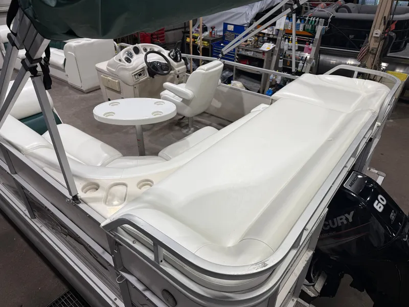 Slide: The Image of Manitou Legacy 240 & 2017 Mercury 4Stroke EFI $12,995 2001 - 6