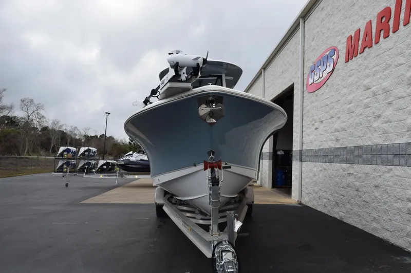 Slide: The Image of 2022 Sea Hunt Ultra 275 SE boat on trailer outside marine dealership. - 3