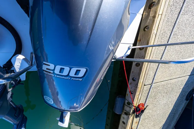 Slide: The Image of 2019 Ranger Tugs R-23 boat with 200 horsepower outboard engine, docked at marina. - 29