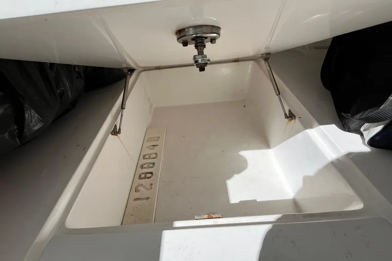 Slide: The Image of Storage compartment of a 2016 SeaHunter 35 Tournament boat, showing interior details. - 21