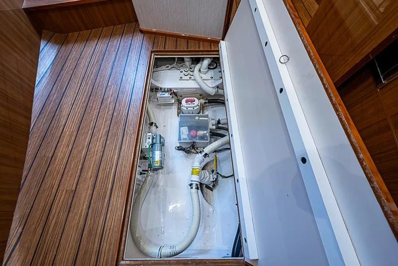 Slide: The Image of Engine compartment of 2021 Viking 38 Open boat with visible mechanical components. - 22