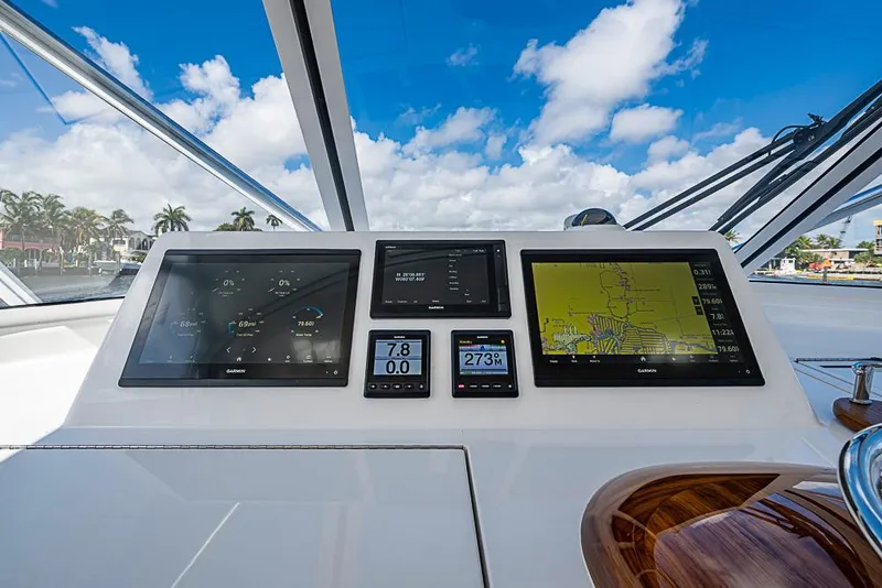 Slide: The Image of Helm of 2021 Viking 38 Open yacht with Garmin navigation displays. - 31