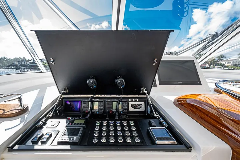 Slide: The Image of Control panel of 2021 Viking 38 Open yacht with advanced navigation equipment. - 33