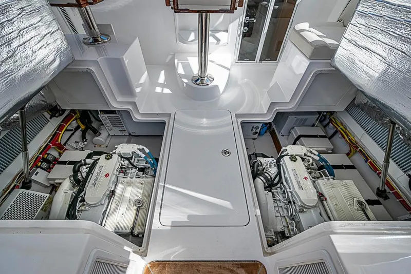 Slide: The Image of Engine room of 2021 Viking 38 Open boat, showcasing dual engines and clean layout. - 36