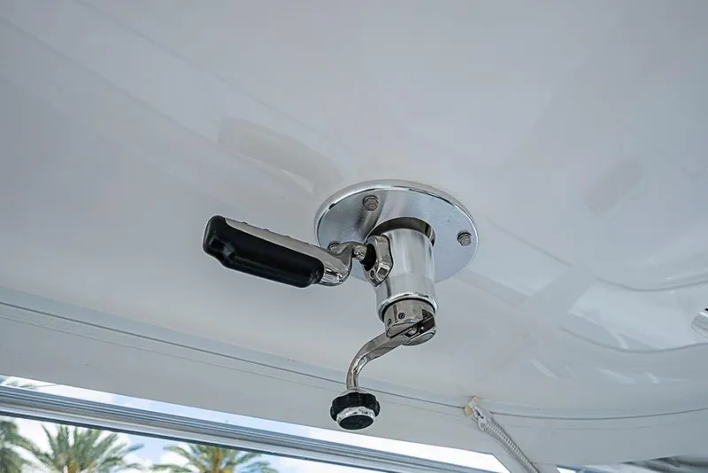 Slide: The Image of Close-up of a 2021 Viking 38 Open boat's fishing rod holder on the ceiling. - 42