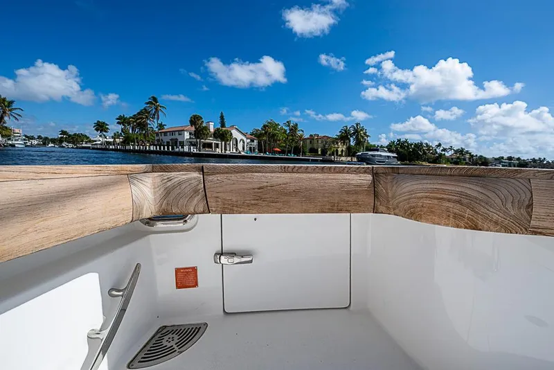 Slide: The Image of 2021 Viking 38 Open boat interior with scenic waterfront view. - 53