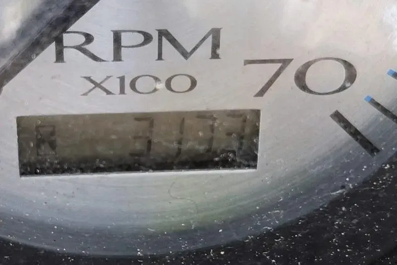 Slide: The Image of 2014 Bennington G22 pontoon boat on trailer, parked outdoors with canopy. - 1