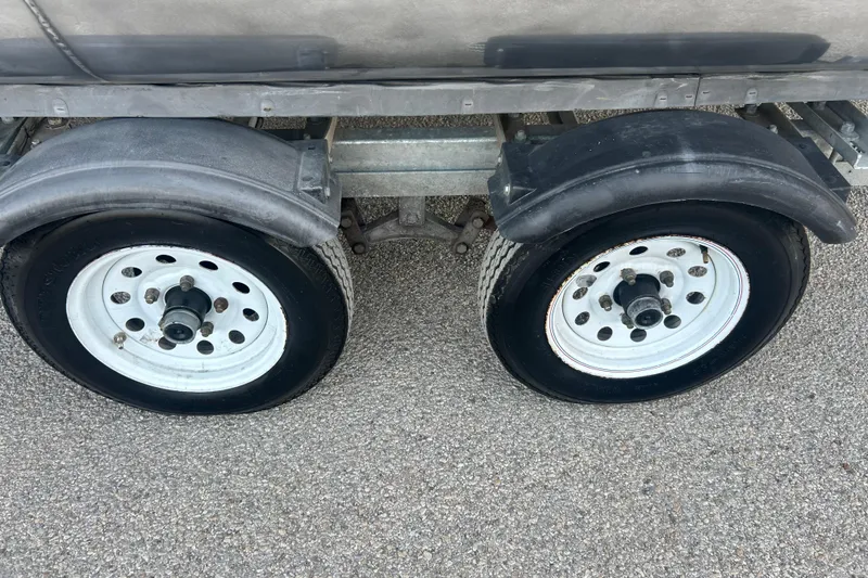 Slide: The Image of Bennington G22 2014 boat cleat with engraved logo on metal surface. - 16