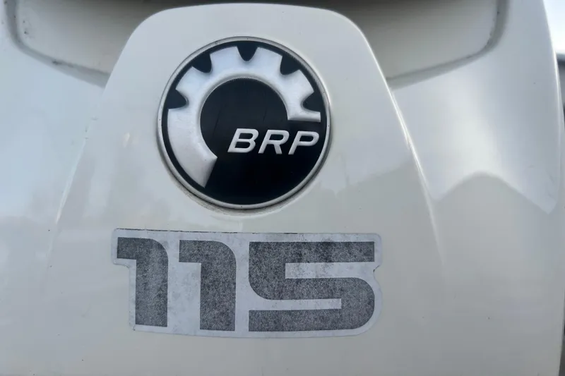 Slide: The Image of 2014 Bennington G22 pontoon boat with spacious seating and modern interior design. - 17