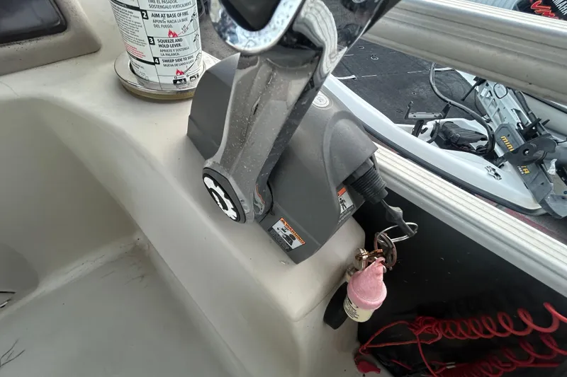 Slide: The Image of Storage compartment in a 2014 Bennington G22 boat with fenders and gear. - 30