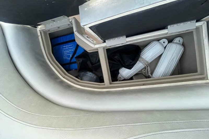 Slide: The Image of Dashboard of a 2014 Bennington G22 showing fuel, RPM, and trim gauges. - 32