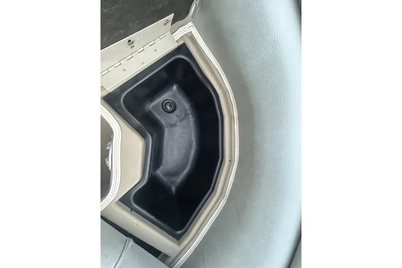 Slide: The Image of 2014 Bennington G22 marine battery compartment with Deka Marine Master battery. - 36