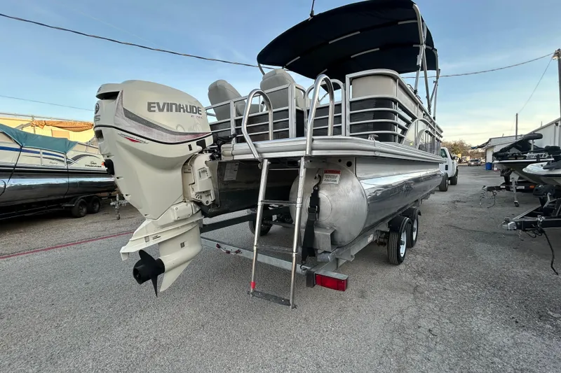 Slide: The Image of 2014 Bennington G22 logo on a reflective surface, showcasing sleek design. - 7