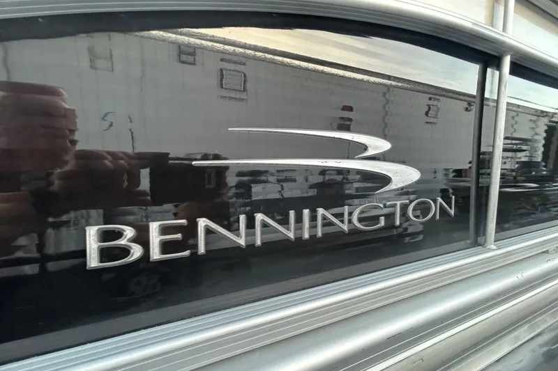 Slide: The Image of 2014 Bennington G22 pontoon boat on trailer, parked outdoors. - 8