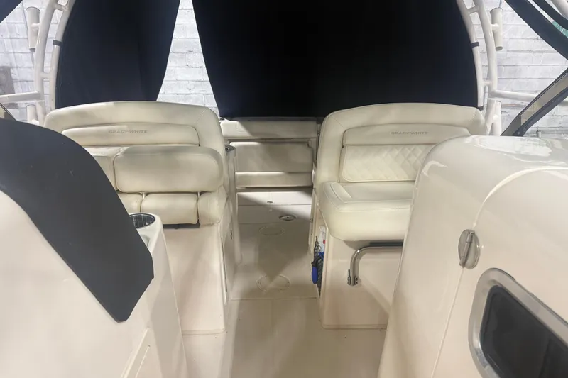 Slide: The Image of Interior of 2022 Grady-White Freedom 307 boat with luxurious seating and modern design. - 17