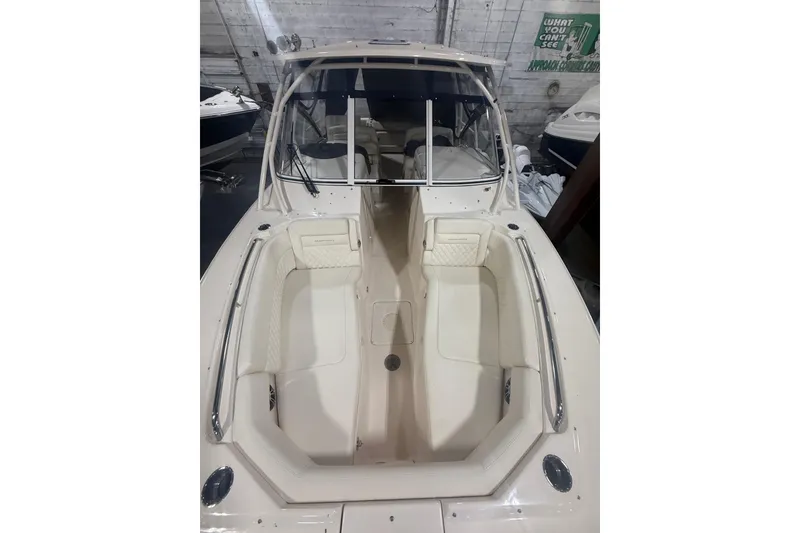 Slide: The Image of 2022 Grady-White Freedom 307 boat interior with spacious seating and sleek design. - 21