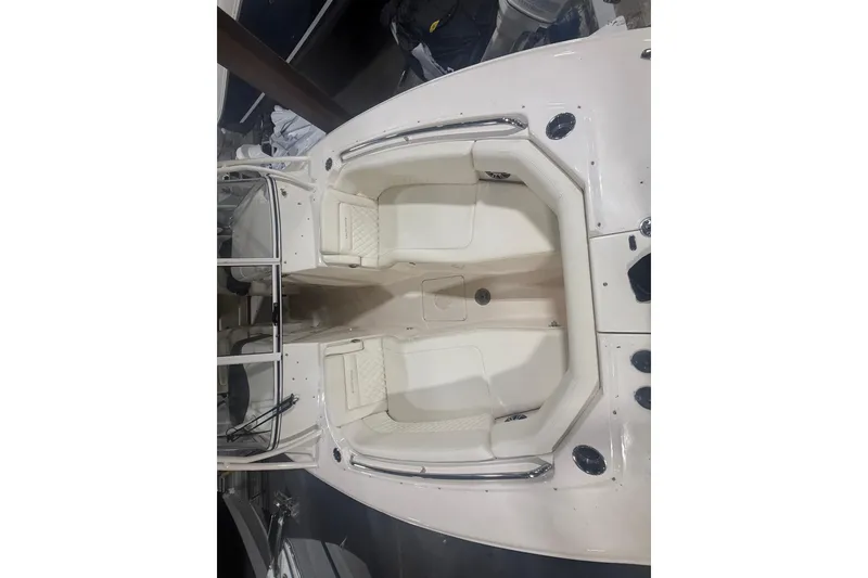 Slide: The Image of 2022 Grady-White Freedom 307 boat interior with dual seating arrangement. - 22