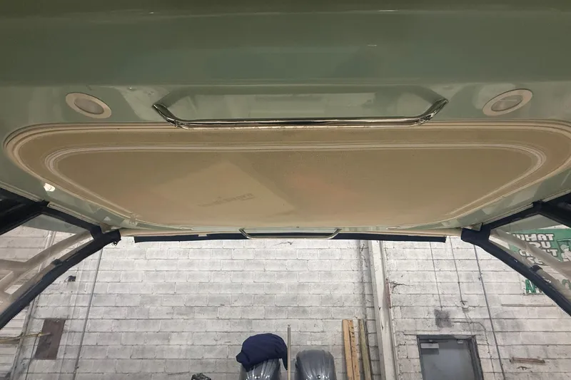 Slide: The Image of 2022 Grady-White Freedom 307 boat interior ceiling with built-in lighting. - 8