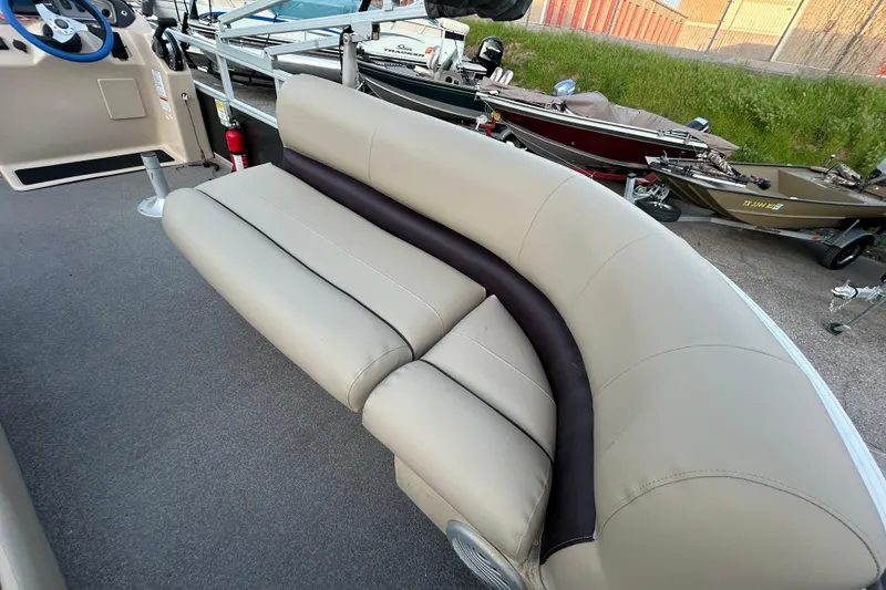 Slide: The Image of 2017 Sun Tracker Party Barge 24 DLX with Mercury 150 engine on trailer. - 19