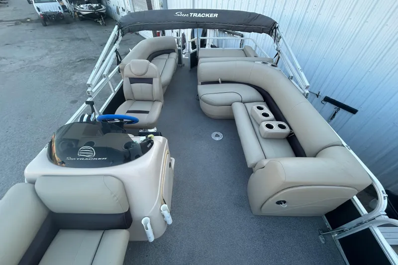 Slide: The Image of 2017 Sun Tracker Party Barge 24 DLX pontoon boat with spacious seating and helm. - 47