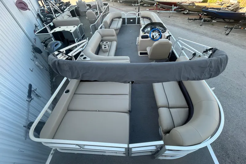 Slide: The Image of 2017 Sun Tracker Party Barge 24 DLX pontoon boat with spacious seating and helm. - 51