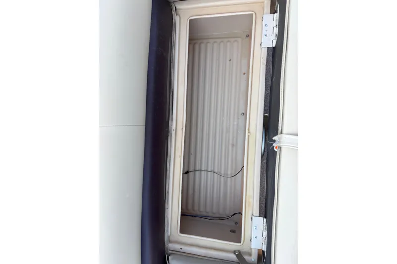 Slide: The Image of Storage compartment of a 2017 Sun Tracker Party Barge 24 DLX boat. - 56