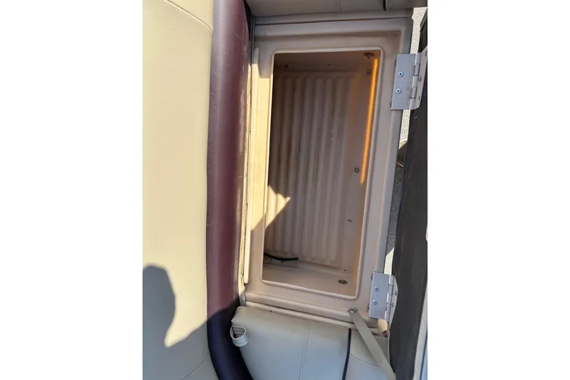 Slide: The Image of Open storage compartment on 2017 Sun Tracker Party Barge 24 DLX boat. - 60