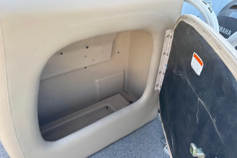 Slide: The Image of Open storage compartment on a 2017 Sun Tracker Party Barge 24 DLX boat. - 64