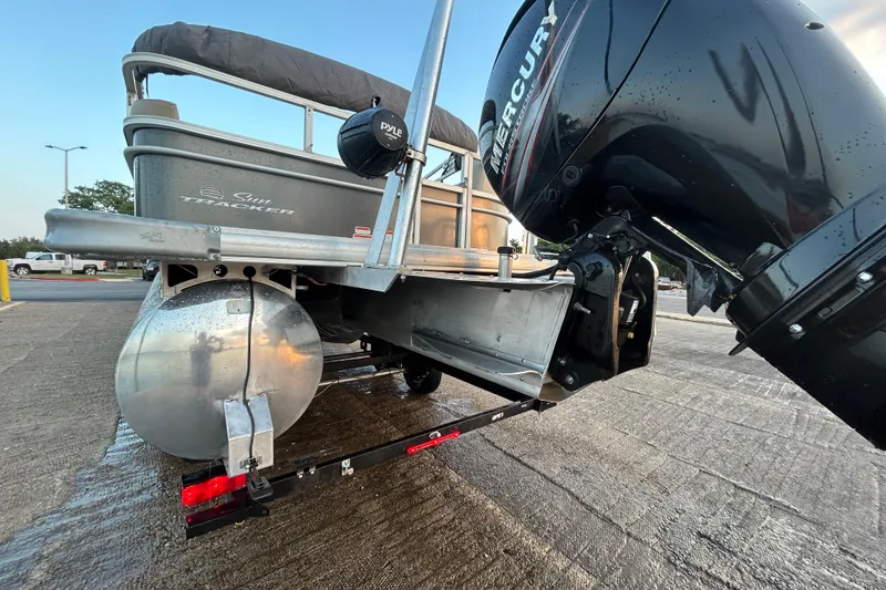 Slide: The Image of 2017 Sun Tracker Party Barge 24 DLX with Mercury outboard engine on trailer. - 72