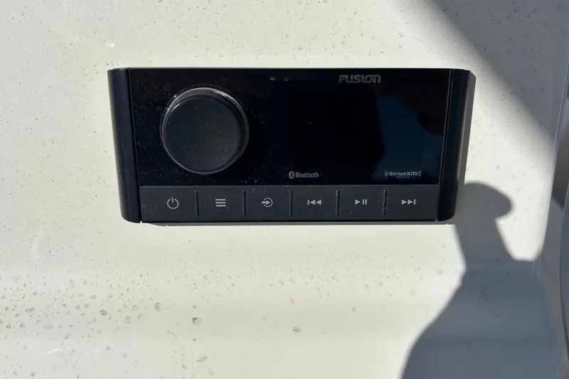 Slide: The Image of Fusion audio system on 2025 Key West 239 FS boat dashboard. - 17