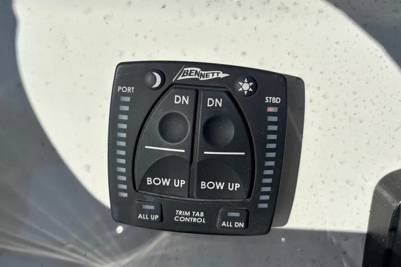 Slide: The Image of Bennett trim tab control panel on 2025 Key West 239 FS boat. - 18