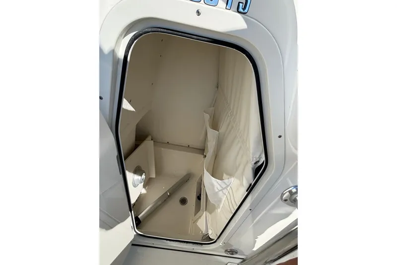 Slide: The Image of Interior storage compartment of 2025 Key West 239 FS boat, featuring organized space. - 20