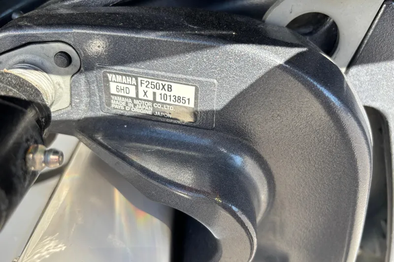 Slide: The Image of Close-up of Yamaha F250XB engine part on 2025 Key West 239 FS boat. - 24