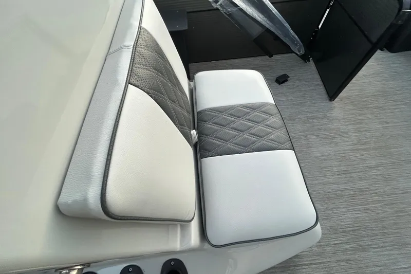 Slide: The Image of 2018 Misty Harbor 210 RF pontoon boat on trailer by the water. - 21