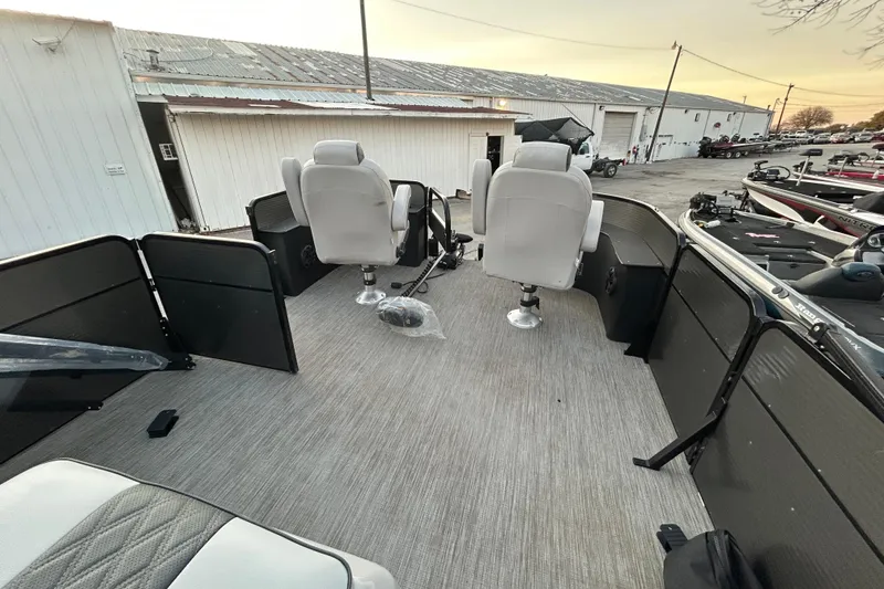 Slide: The Image of 2018 Misty Harbor 210 RF pontoon boat on trailer by a lake. - 22