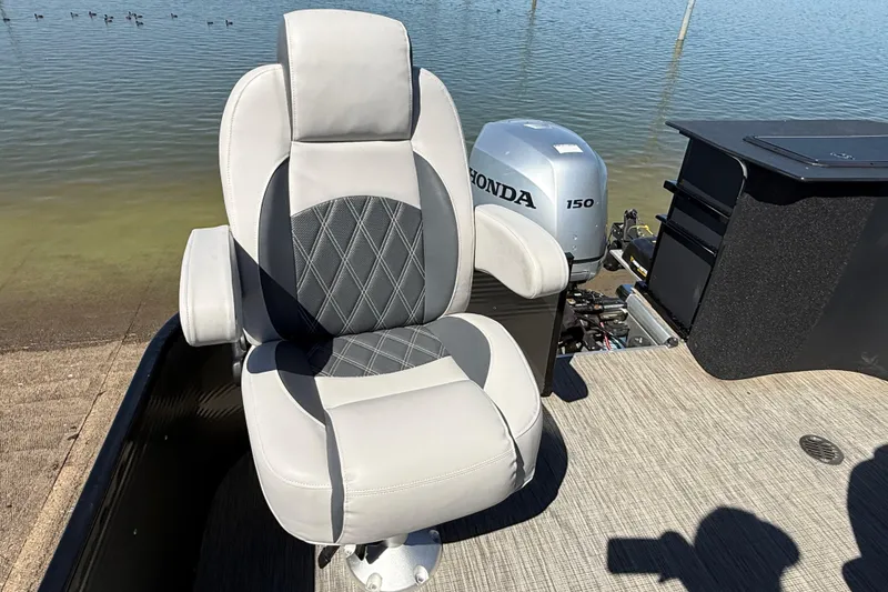Slide: The Image of Captain's chair on 2018 Misty Harbor 210 RF boat with Honda 150 engine. - 36