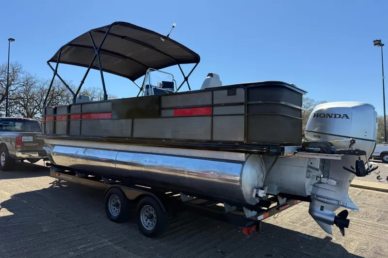 Slide: The Image of 2018 Misty Harbor 210 RF pontoon boat with Honda outboard motor on trailer. - 44