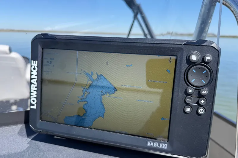 Slide: The Image of Lowrance Eagle9 GPS on Misty Harbor 210 RF boat, displaying a detailed waterway map. - 49