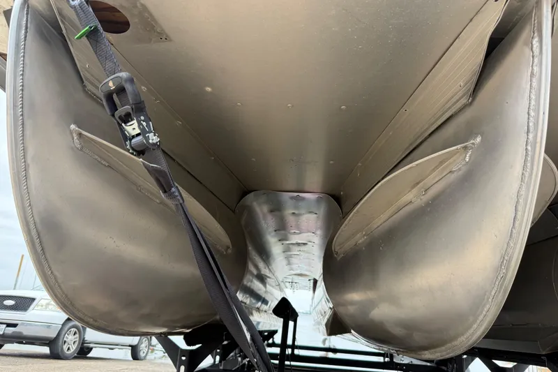 Slide: The Image of Underneath view of a 2018 Misty Harbor 210 RF pontoon boat, showing pontoons and straps. - 54