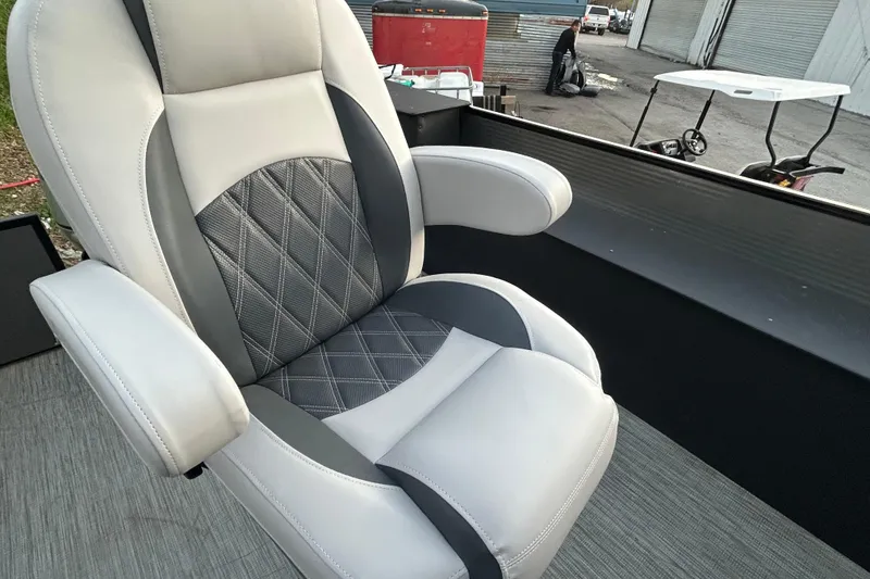 Slide: The Image of 2018 Misty Harbor 2285RF boat seat with gray and white upholstery, diamond pattern design. - 23