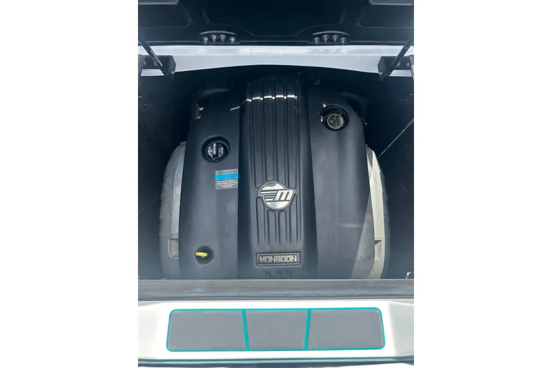 Slide: The Image of 2022 Malibu Wakesetter 23 LSV engine compartment showcasing Monsoon engine. - 10